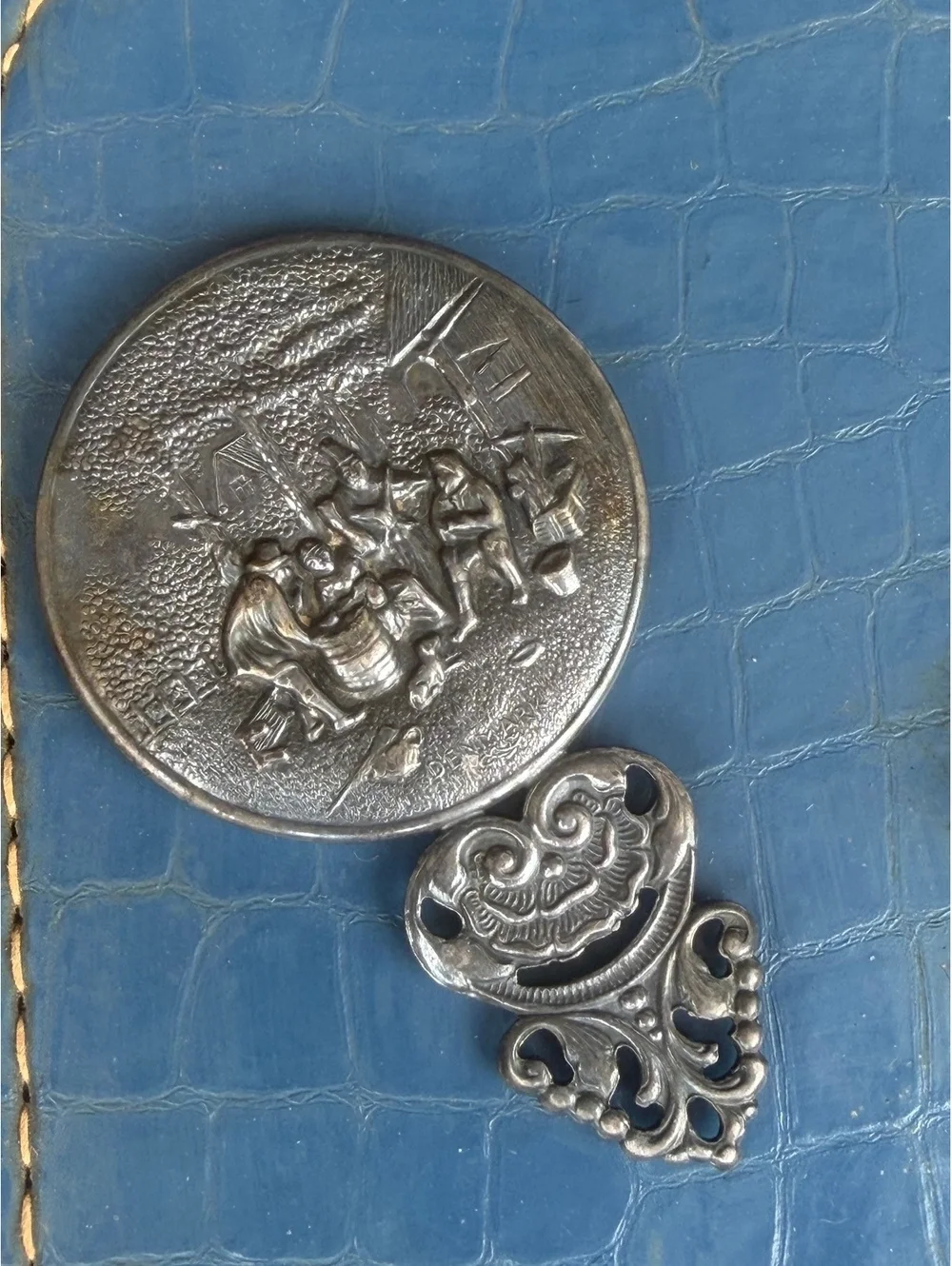 Vintage Decorative Hand Mirror with Engraved Scene and Ornate Handle